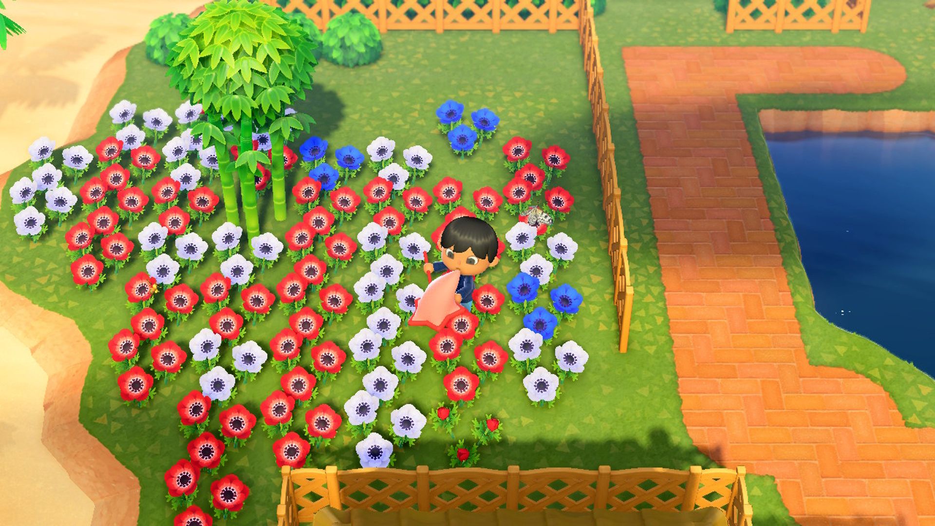 Male Player Catching Insects In Flowerbed With Star Net In Animal Crossing New Horizons