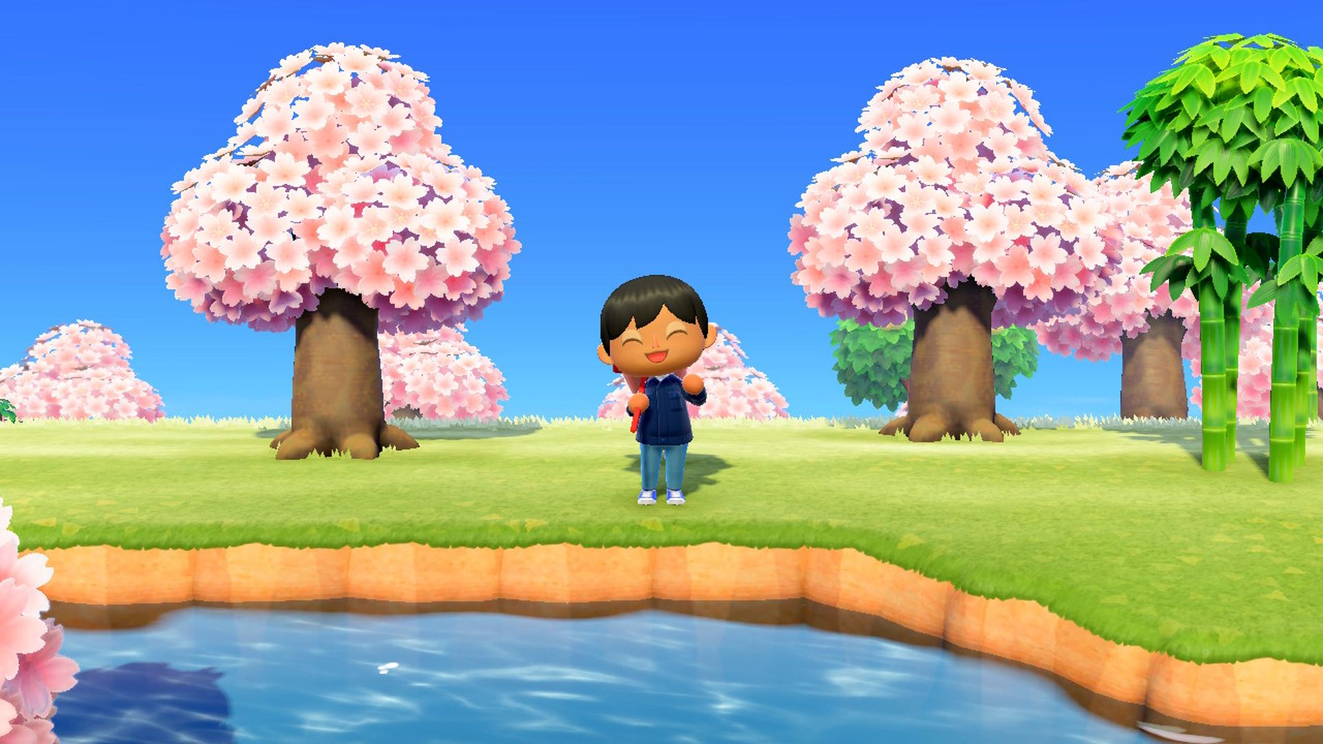 Male Player Smiling And Waving While Standing Near Cherry Blossom Trees And River In Animal Crossing New Horizons